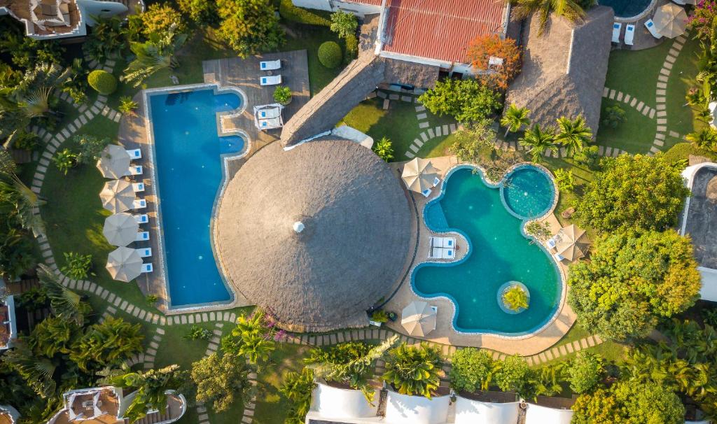 Bazén v ubytování Navutu Dreams Resort & Wellness Retreat nebo v jeho okolí