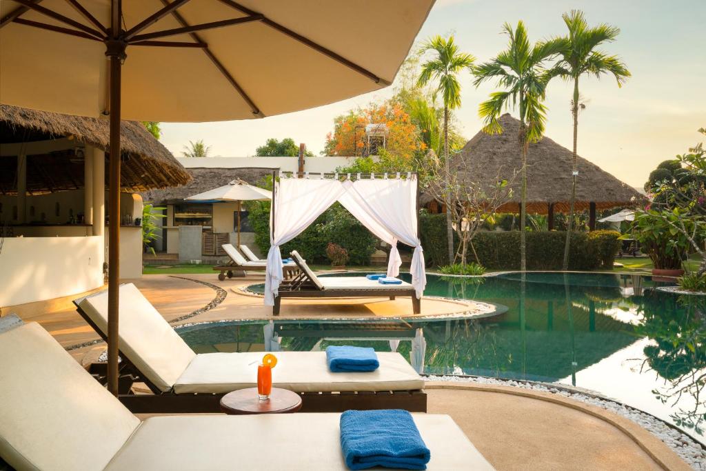 Bazén v ubytování Navutu Dreams Resort & Wellness Retreat nebo v jeho okolí