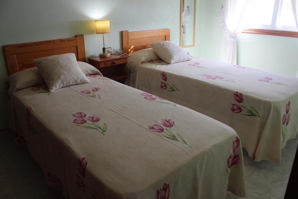 Postel nebo postele na pokoji v ubytování Apartamentos Solmar