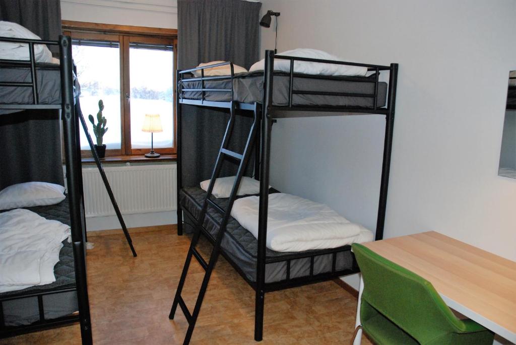 Postel nebo postele na pokoji v ubytování Storstrand Kursgård