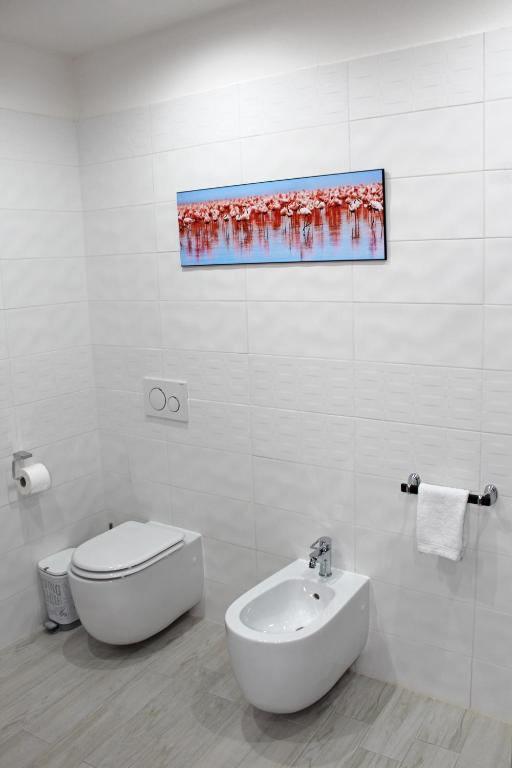 Łazienka w obiekcie Flamingo Luxury Apartment AJPSARDINIA