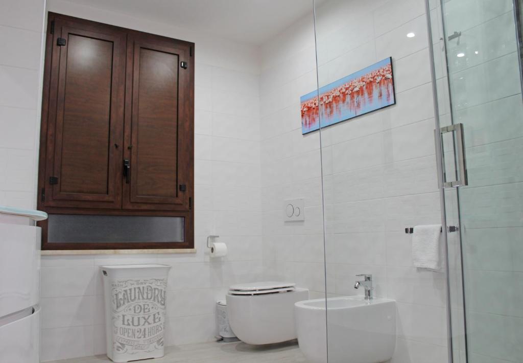 Łazienka w obiekcie Flamingo Luxury Apartment AJPSARDINIA