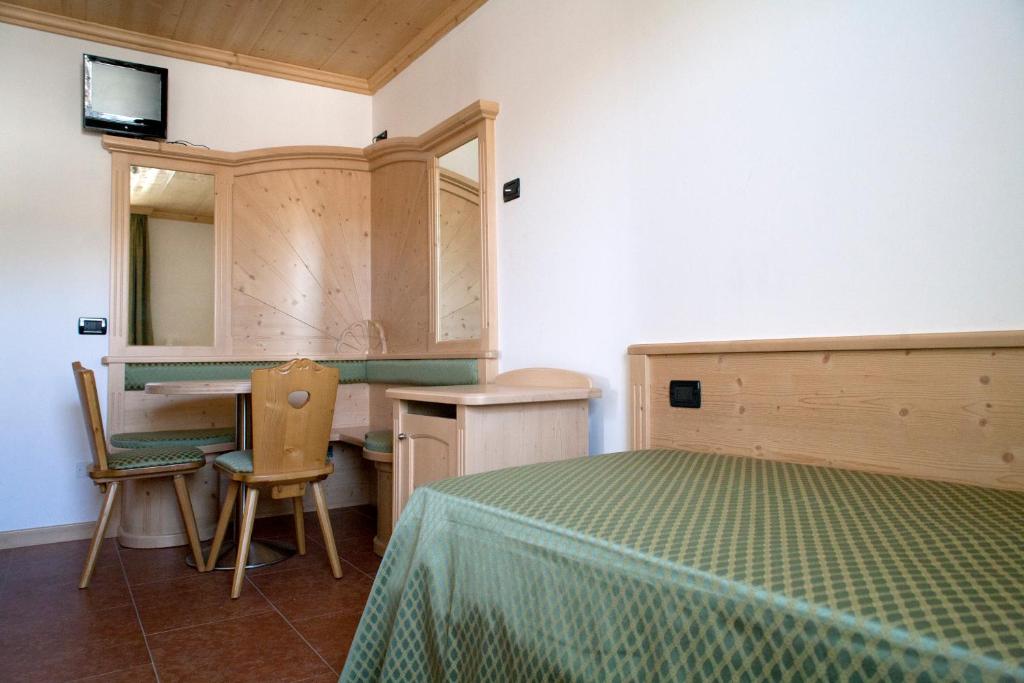 Postel nebo postele na pokoji v ubytování Agritur Scoiattolo
