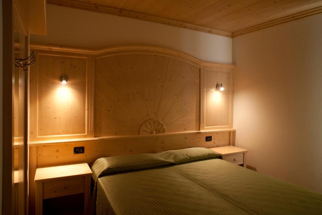 Postel nebo postele na pokoji v ubytování Agritur Scoiattolo