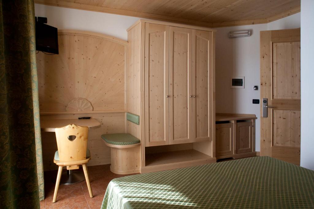 Postel nebo postele na pokoji v ubytování Agritur Scoiattolo