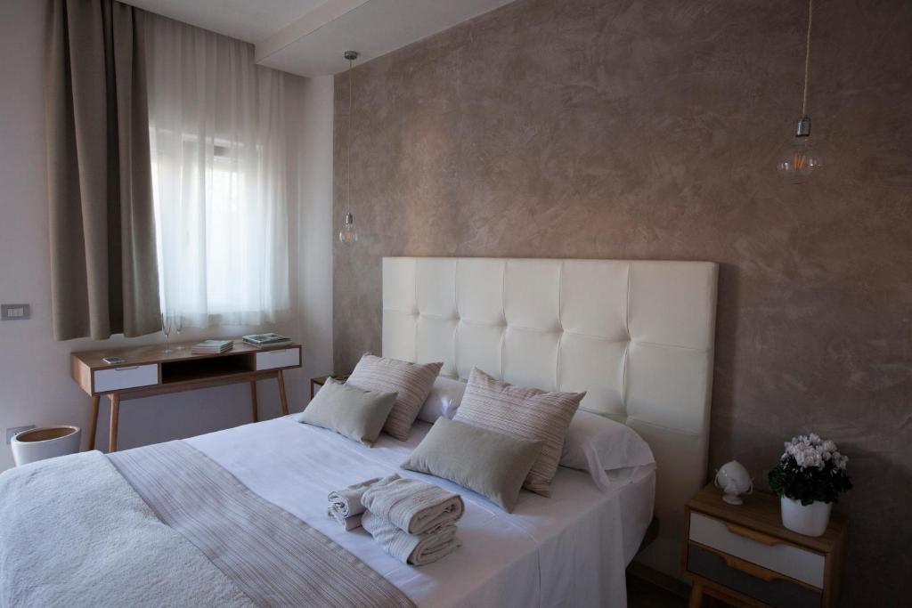 Postel nebo postele na pokoji v ubytování Avantgarde Hotel