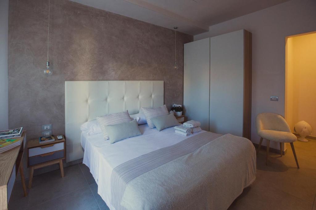Postel nebo postele na pokoji v ubytování Avantgarde Hotel