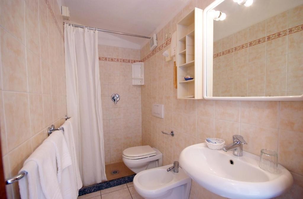 Ein Badezimmer in der Unterkunft Hotel La Stella