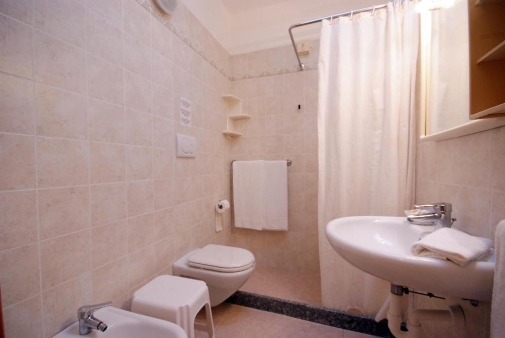 Ein Badezimmer in der Unterkunft Hotel La Stella
