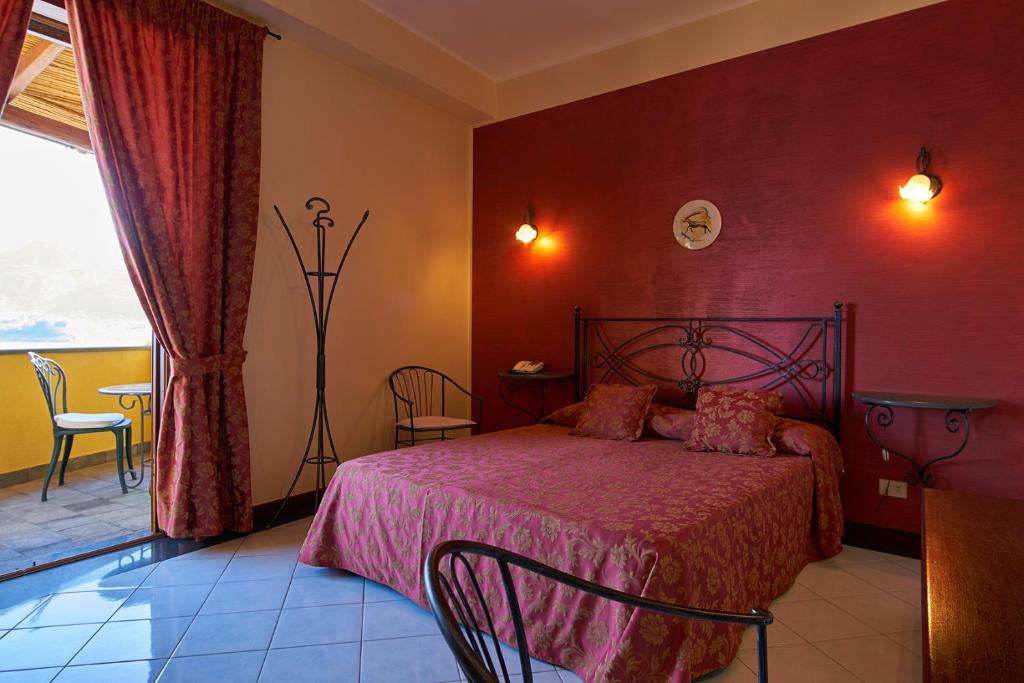 Postel nebo postele na pokoji v ubytování Hotel A Pinnata