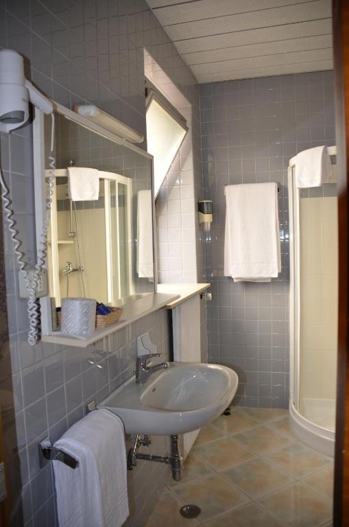 Koupelna v ubytování Hotel Milano