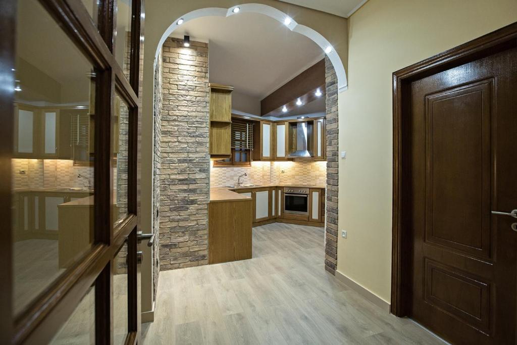 Kuchyň nebo kuchyňský kout v ubytování Paradise Apartment in Peiraiki