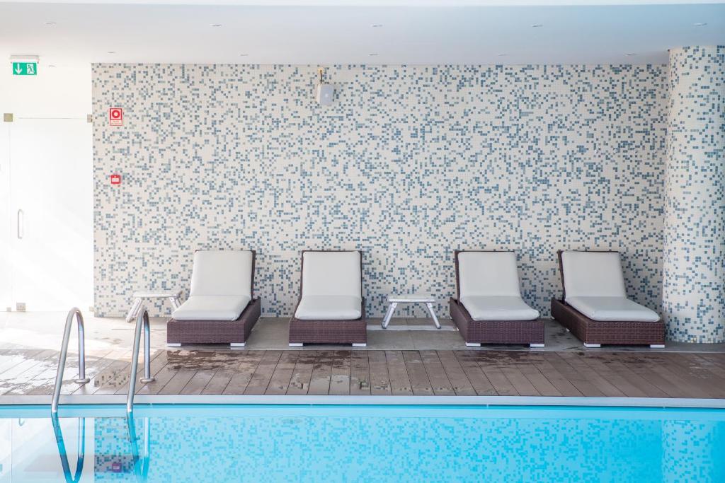 Bazén v ubytování Melia Ria Hotel & Spa nebo v jeho okolí
