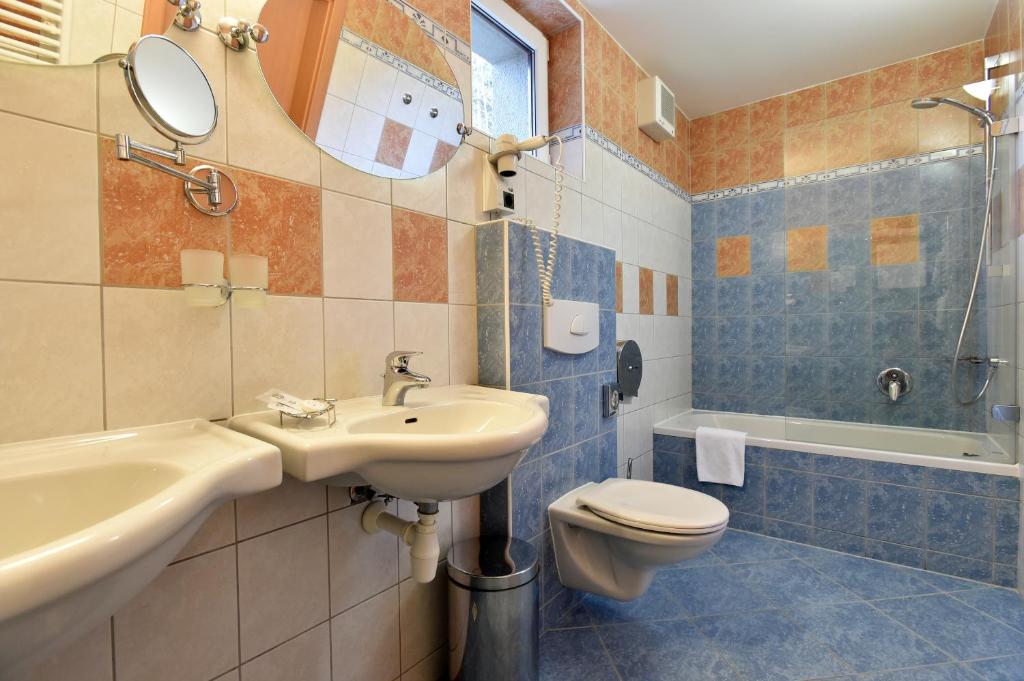 Koupelna v ubytování Hotel Břízky