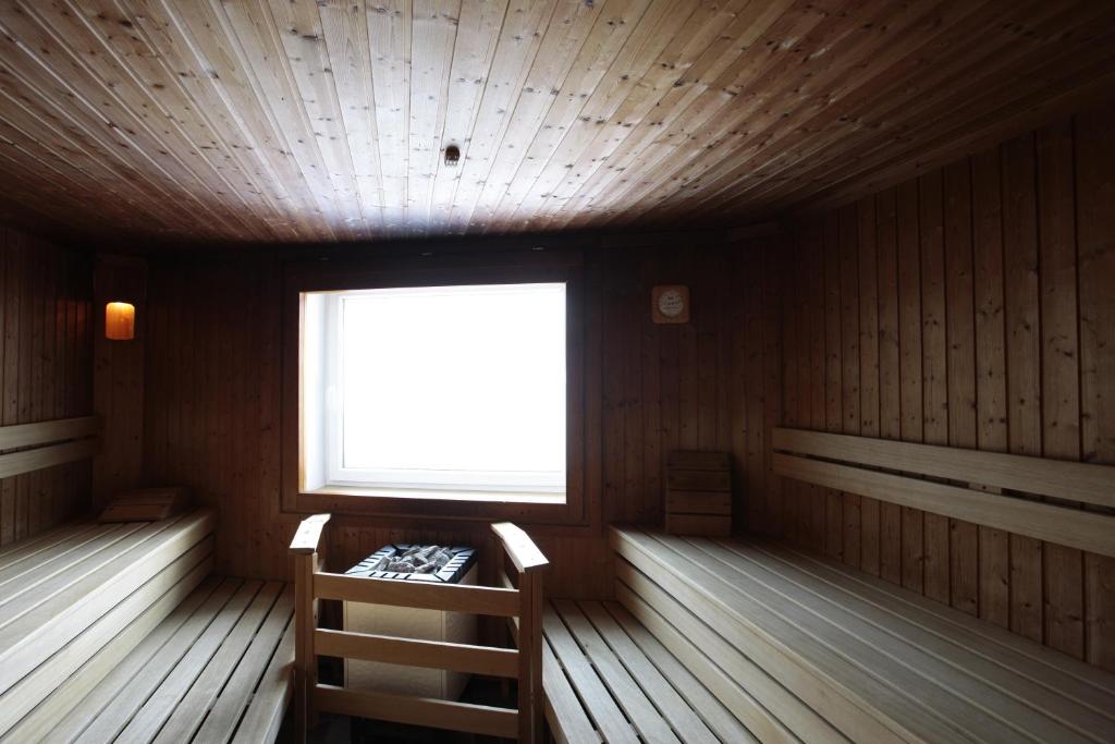 TV a/nebo společenská místnost v ubytování Design Hotel Miramonte
