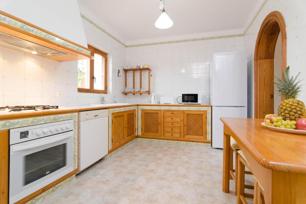 Kuchyň nebo kuchyňský kout v ubytování Finca Sant Blai Nou