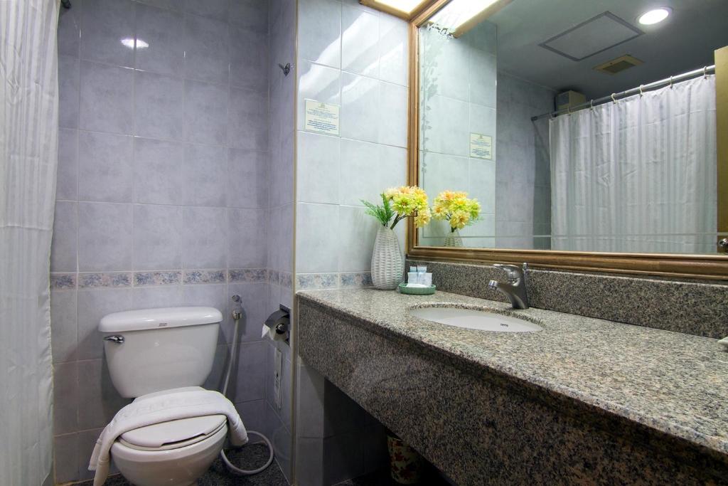 Koupelna v ubytování Bossotel Chiang Mai