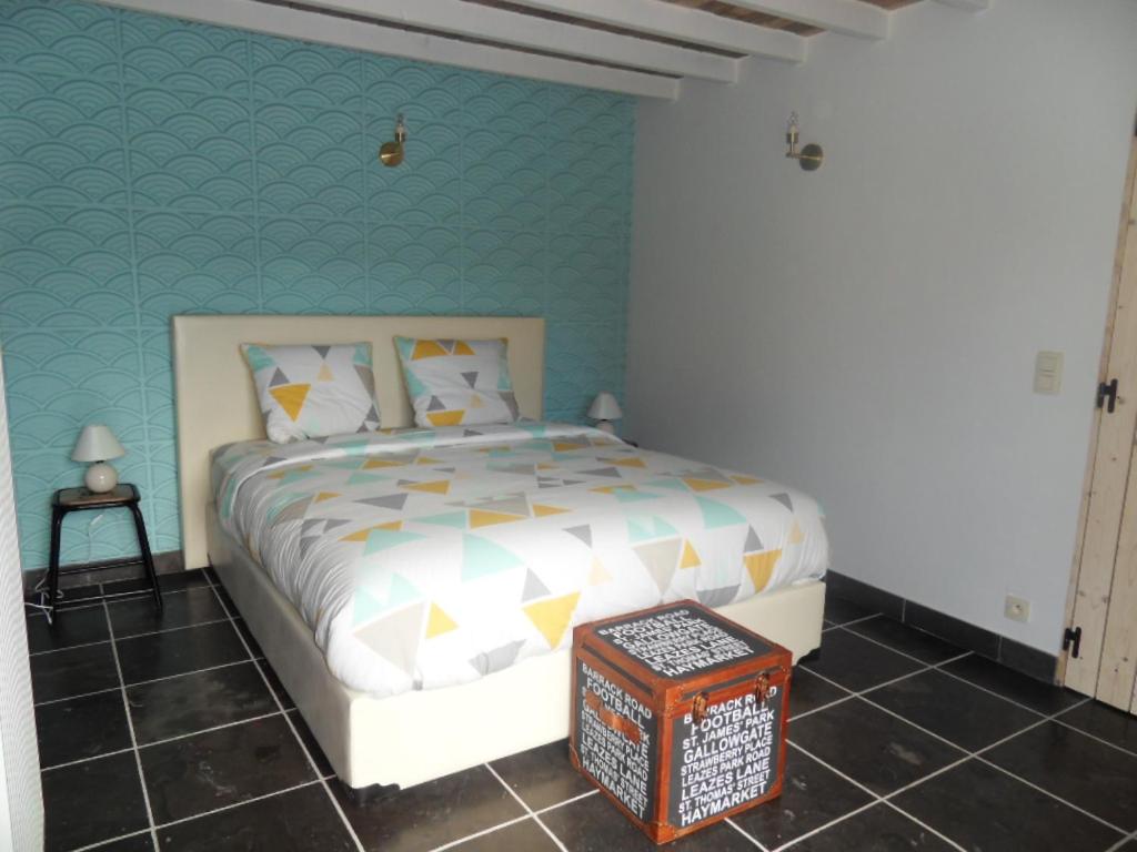 Postel nebo postele na pokoji v ubytování B&B 'Het Logiement
