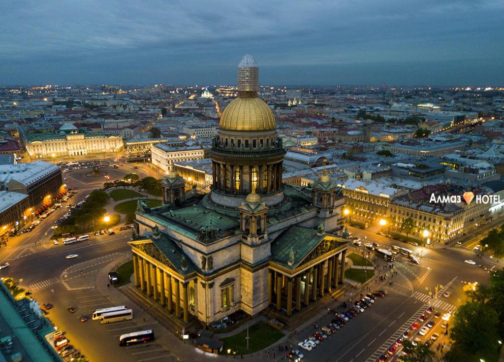 an aerial view of the parliament building at night at Almaz hotel in Saint Petersburg