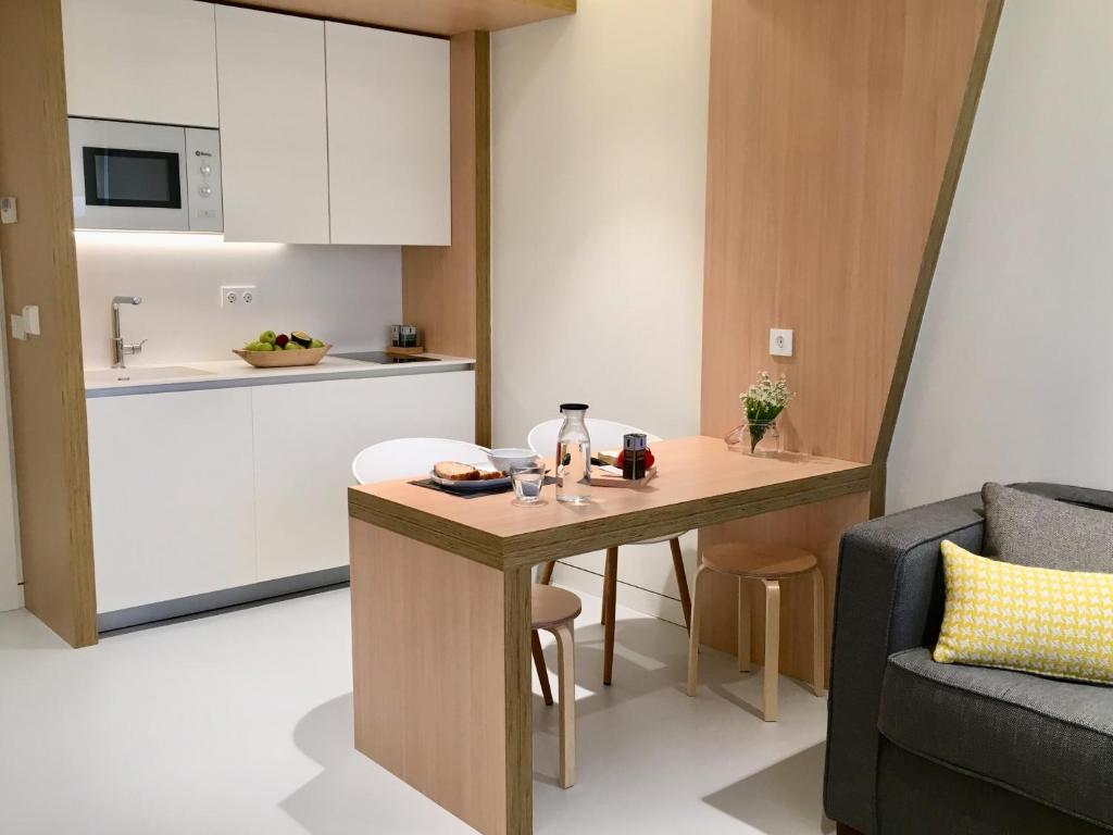 Kuchyň nebo kuchyňský kout v ubytování Inside Bilbao Apartments
