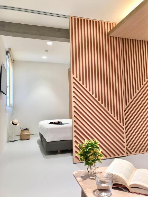 Postel nebo postele na pokoji v ubytování Inside Bilbao Apartments