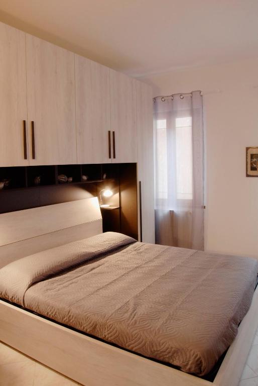 Postel nebo postele na pokoji v ubytování CORTE Apartment
