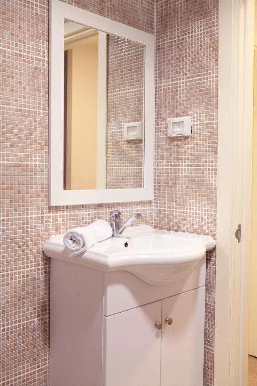Koupelna v ubytování Idelson Hotel