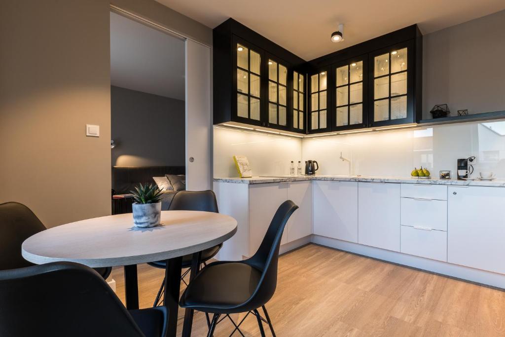Kuchyňa alebo kuchynka v ubytovaní Tartaczna Street Apartment