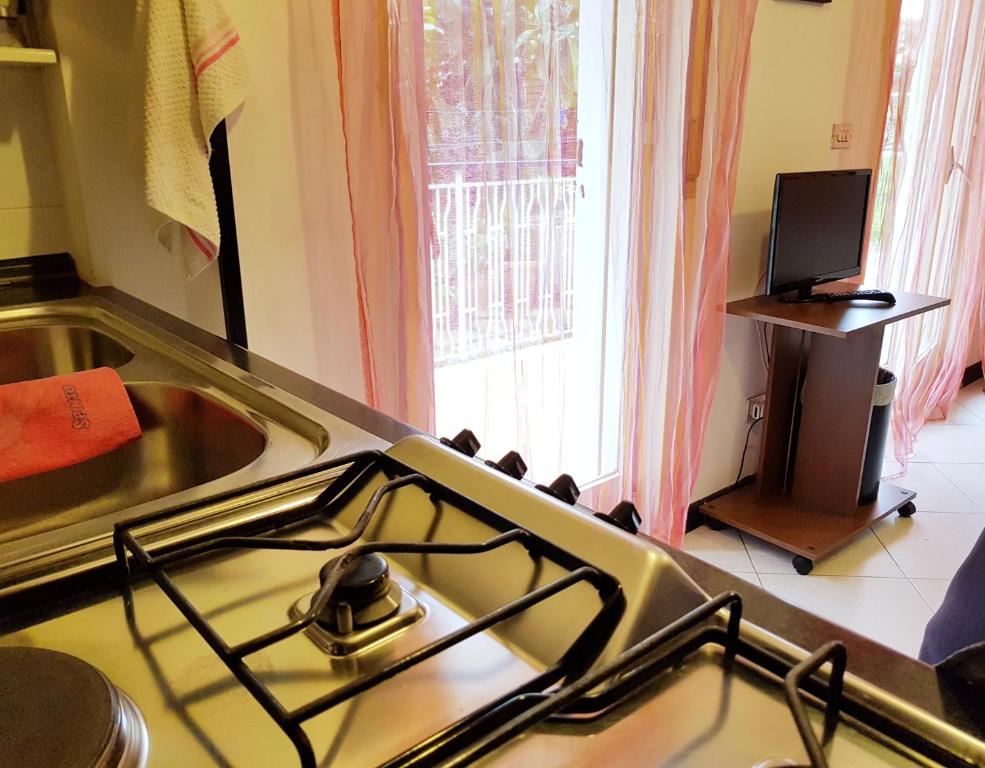 Kuchyň nebo kuchyňský kout v ubytování Catania house Apartment