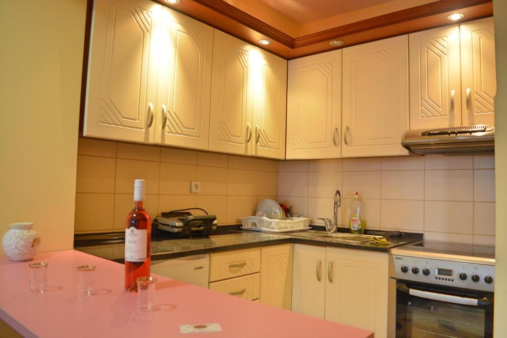 Kuchyň nebo kuchyňský kout v ubytování George 59 Apartment