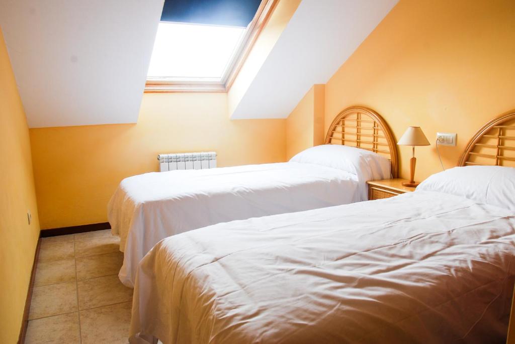 Postel nebo postele na pokoji v ubytování Apartamentos Granxola