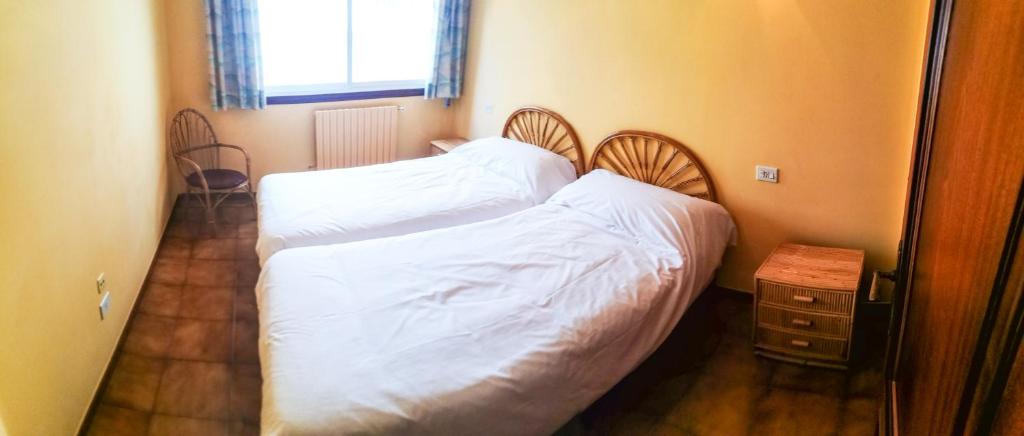 Postel nebo postele na pokoji v ubytování Apartamentos Granxola