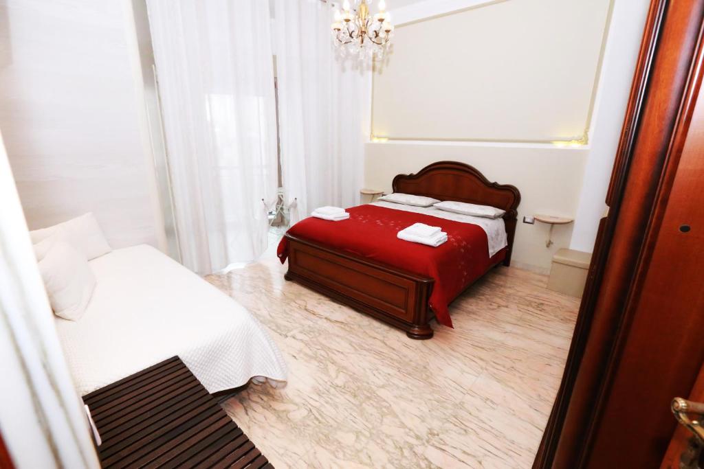 Postel nebo postele na pokoji v ubytování Apulia 70 Holidays - Suites & Experiences