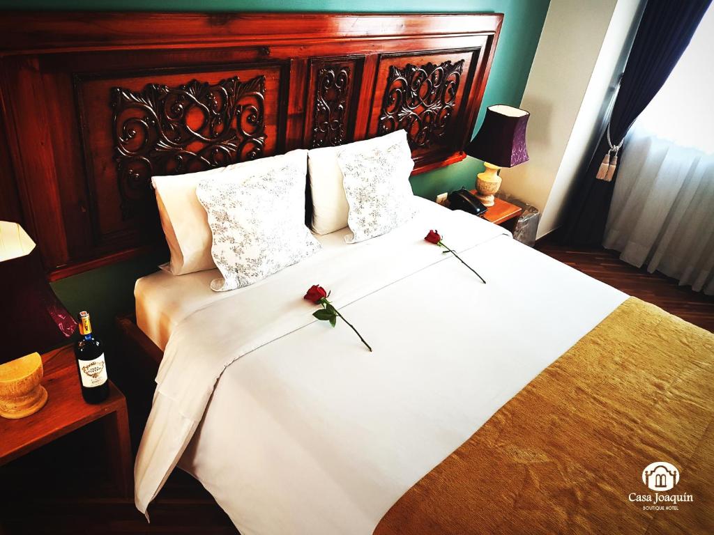 Postel nebo postele na pokoji v ubytování Casa Joaquin Boutique Hotel