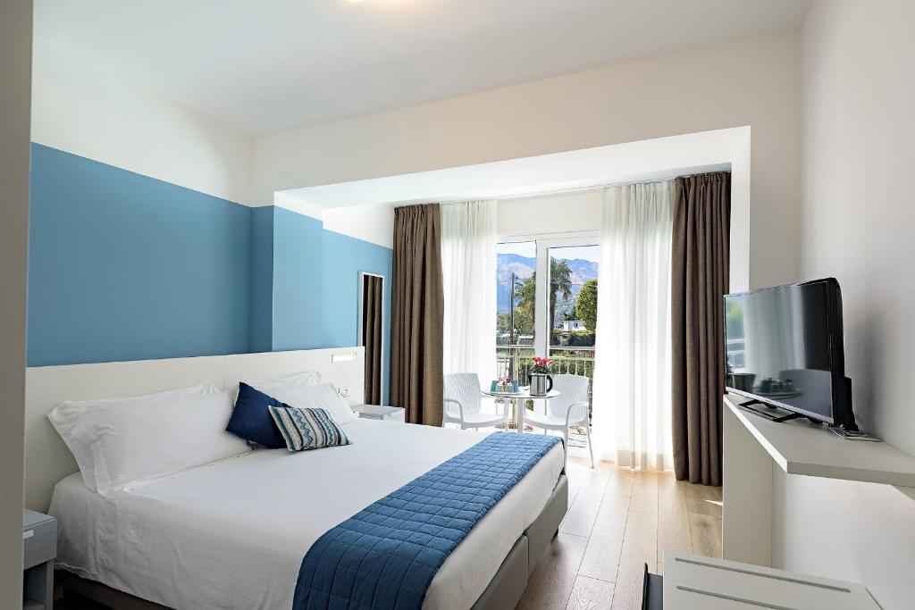 TV a/nebo společenská místnost v ubytování Hotel Vischi