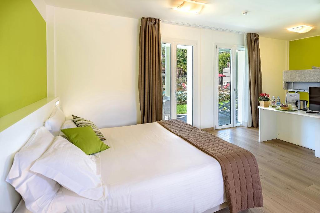 Kuchyň nebo kuchyňský kout v ubytování Hotel Vischi
