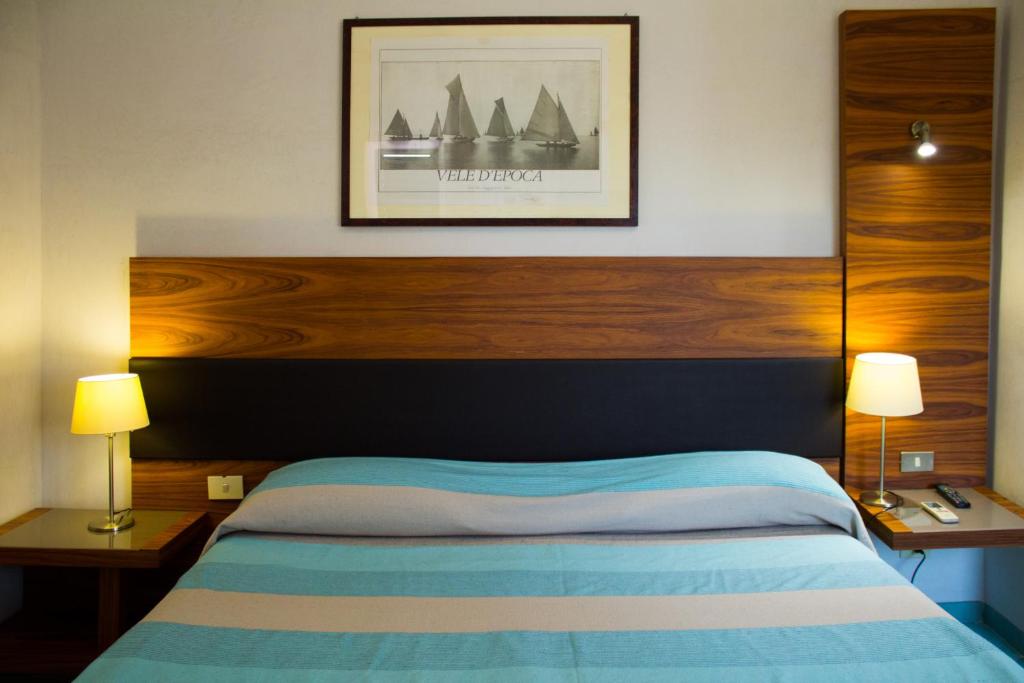 Postel nebo postele na pokoji v ubytování Albergo Villa Anna