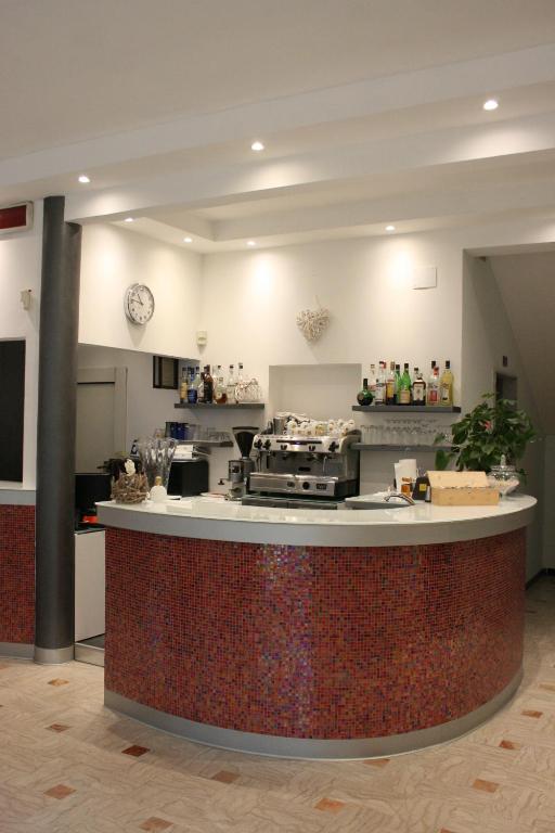 Kuchyň nebo kuchyňský kout v ubytování Hotel Ardesia