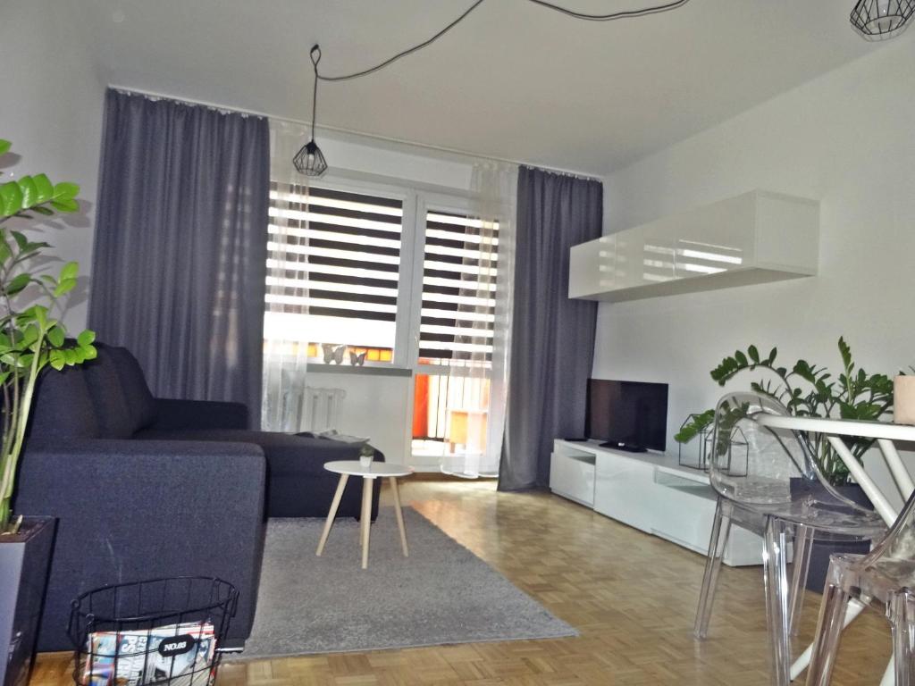 Гостиная зона в Araval Apartament