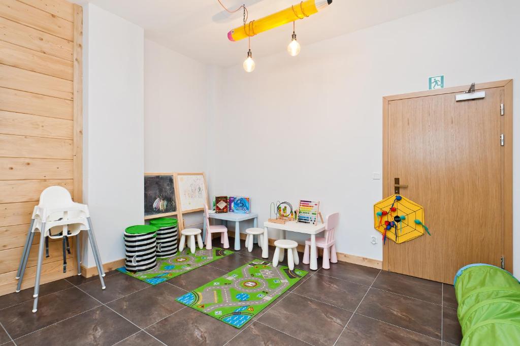 Posedenie v ubytovaní Apartamenty Sun & Snow Resorts Lipki Park z sauną