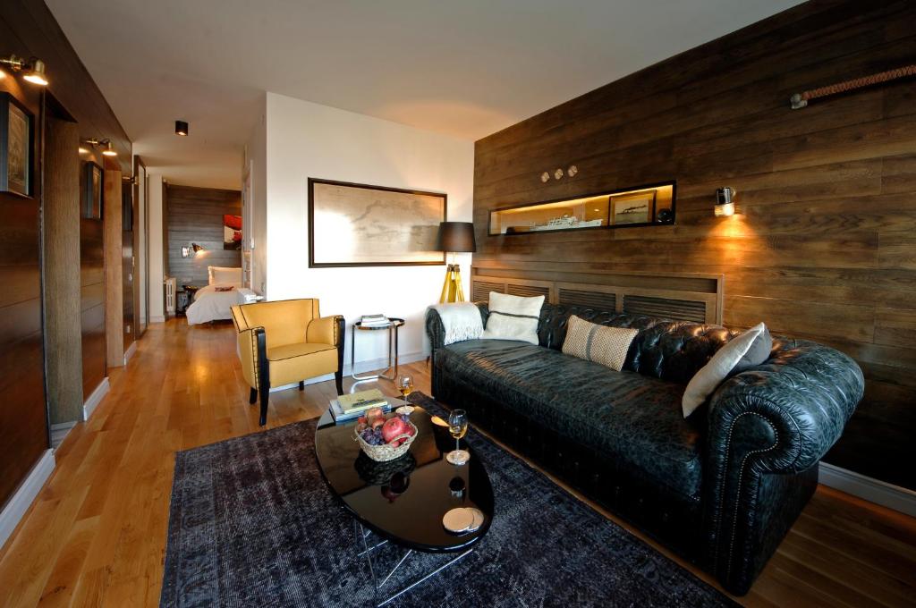 a living room with a couch and a table at Urban Suites in Istanbul