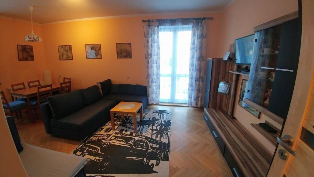 Kuchyň nebo kuchyňský kout v ubytování NavyBlue Apartments