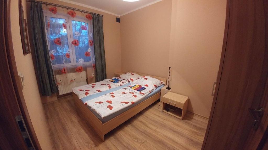 Postel nebo postele na pokoji v ubytování NavyBlue Apartments