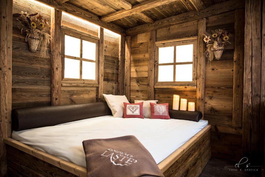 Postel nebo postele na pokoji v ubytování Residence Lastè