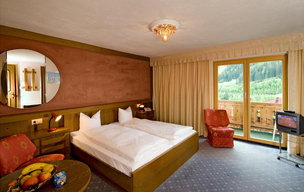 Postel nebo postele na pokoji v ubytování Hotel Olympia