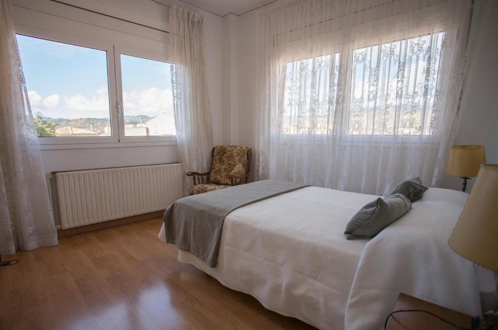 Postel nebo postele na pokoji v ubytování Hotel Segle XX
