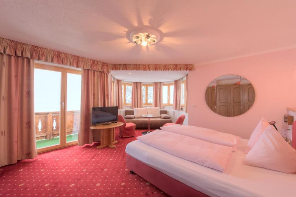 Postel nebo postele na pokoji v ubytování Hotel Olympia