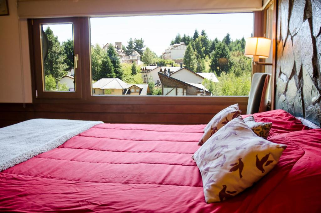 Postel nebo postele na pokoji v ubytování Kurtem Lodge