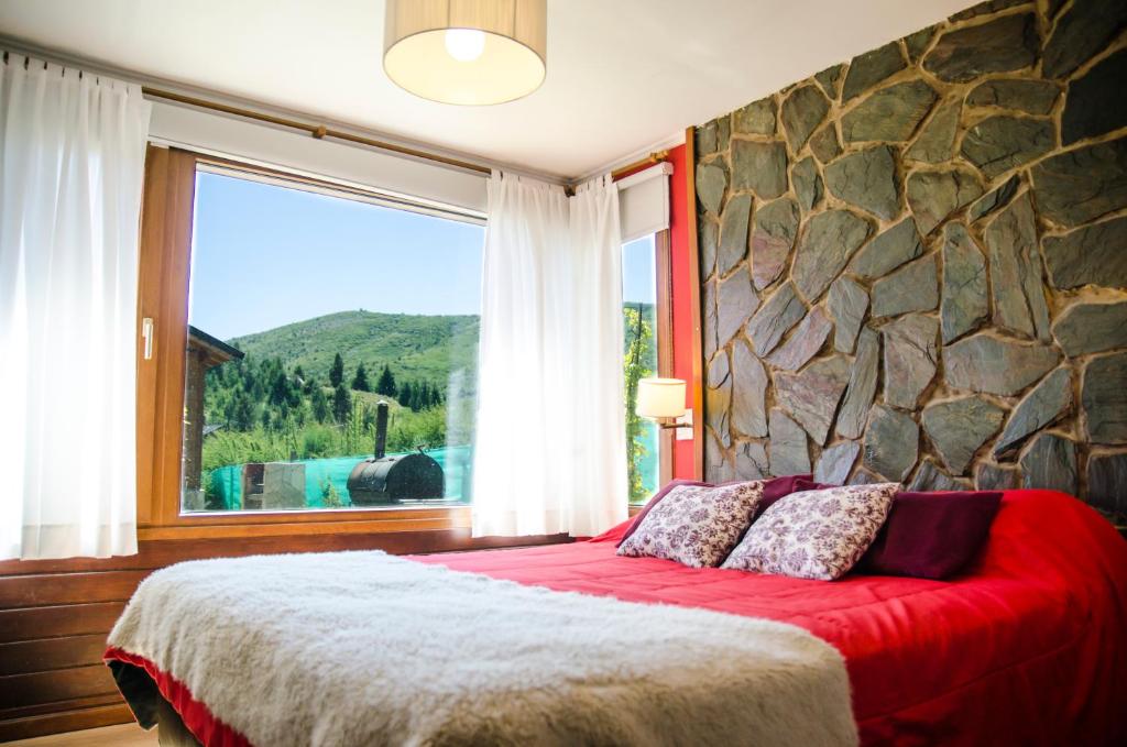 Postel nebo postele na pokoji v ubytování Kurtem Lodge