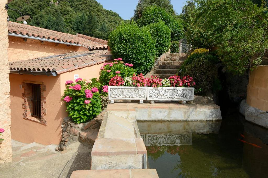 Zahrada ubytování Apartamento en pleno Montseny Mas Romeu Turisme Rural